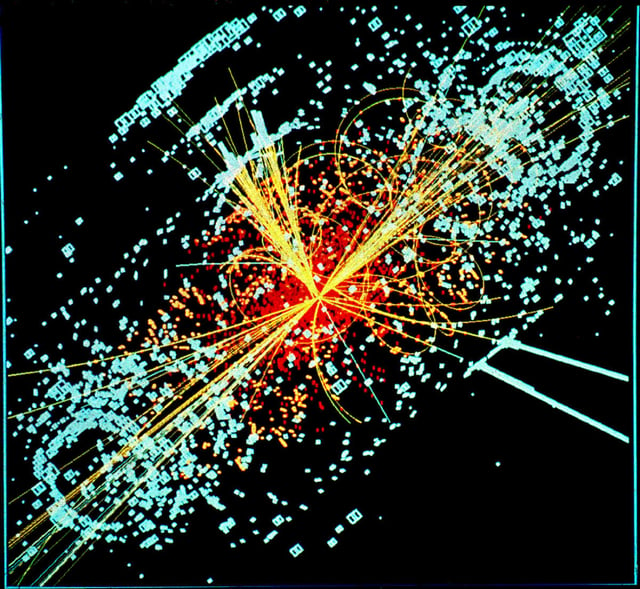 A simulated event in the CMS detector of the Large Hadron Collider, featuring a possible appearance of the Higgs boson.