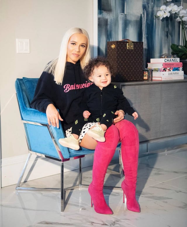 Alaina Anderson pictured on her Instagram with her child
