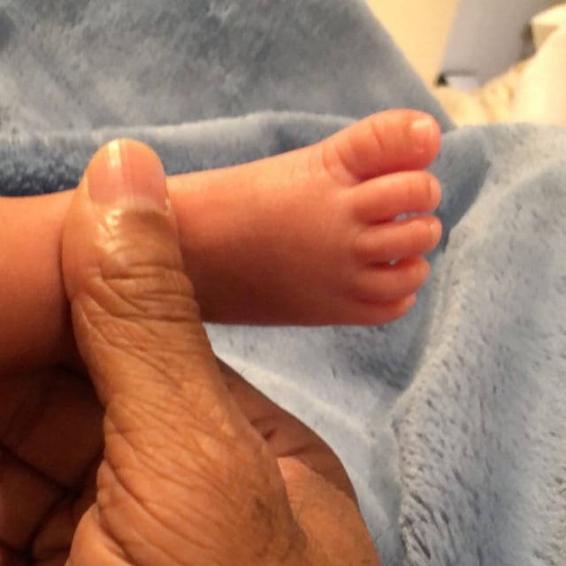 Kenneth Petty and Nicki Minaj child's foot pictured on Instagram