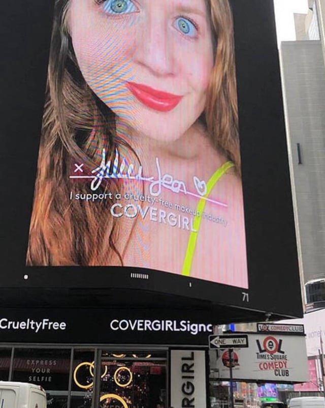 Lillee Jean modelling on a billboard for Covergirl in Times Square, New York
