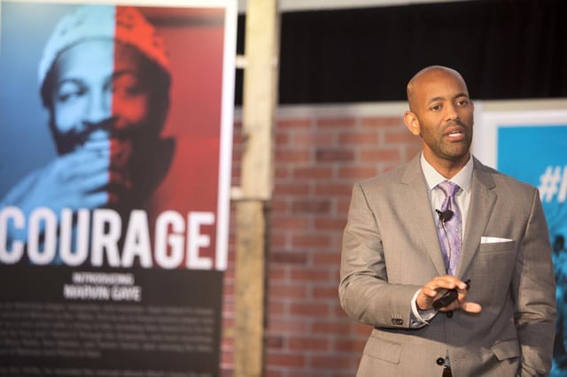 Cedric speaking at an event