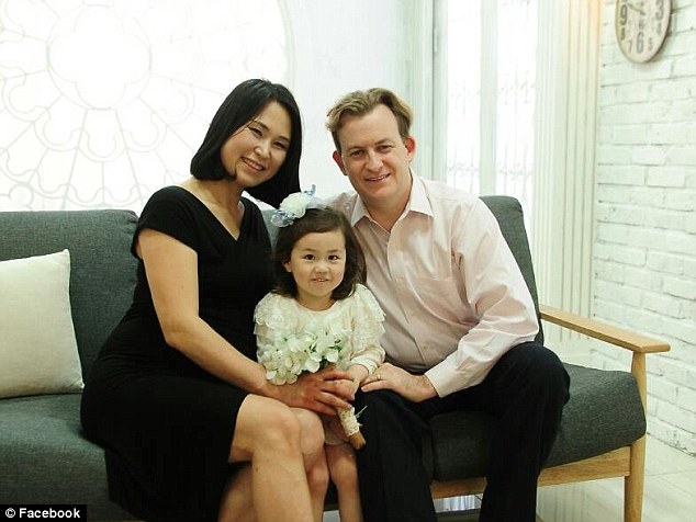 Robert Kelly with his wife, Jung-a Kim (a yoga teacher), and their daughter Marion