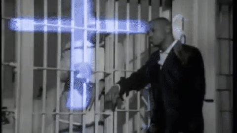 2Pac and Mopreme walk away from their father while visiting him in jail