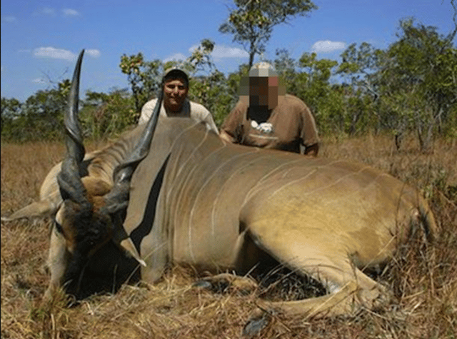 Photo of Botha with a client and their catch.