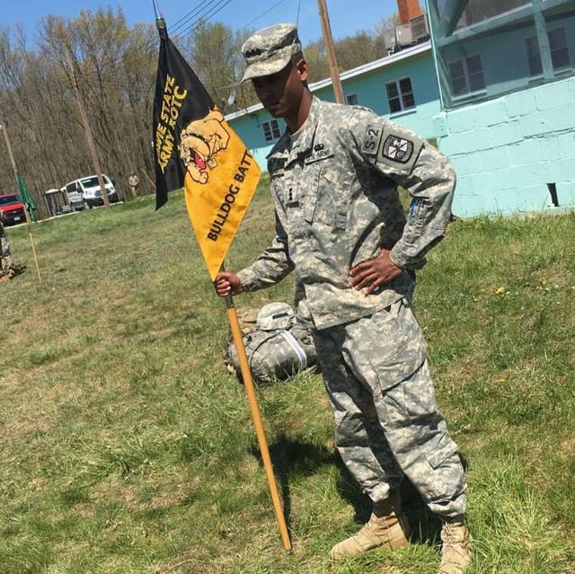 Photo of Collins in his US Army fatigues