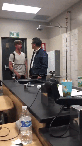 Gideon Yapp (left) yelling at physics teacher Franklin Hsu (right).