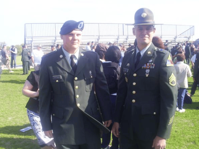 Photo of Chad with an officer at a event.