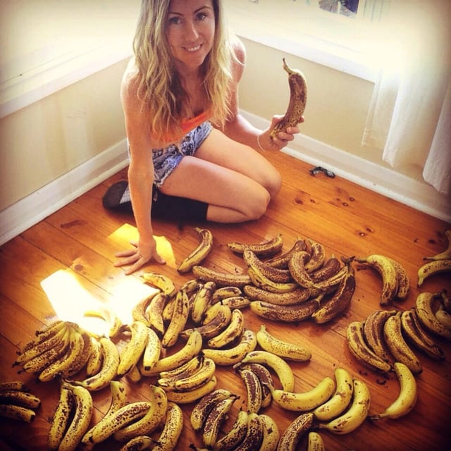 Leanne surrounded by bananas