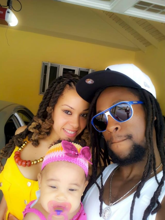Kamila with her husband and her daughter