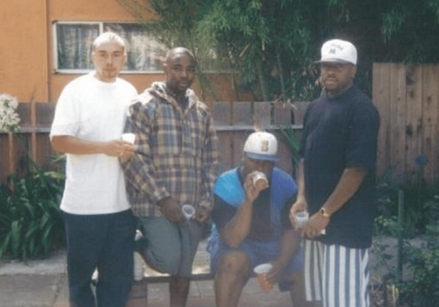 Photo taken in 93' of Malcolm with his friends as a young man in Oakland.