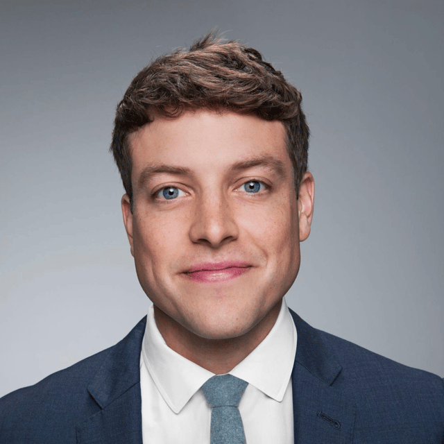 The professional headshot of Kevin.