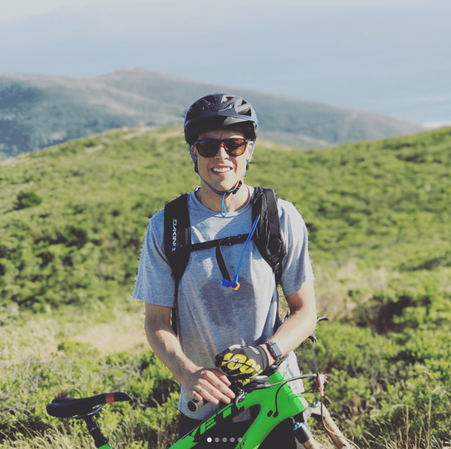 Kevin enjoys bicycle rides in nature.