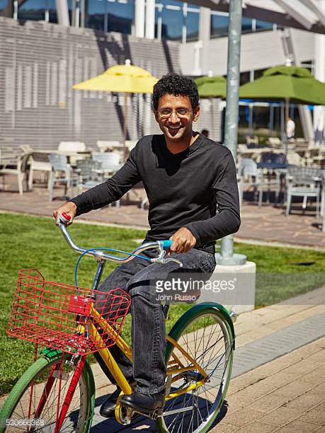 Ben riding a Google bicycle