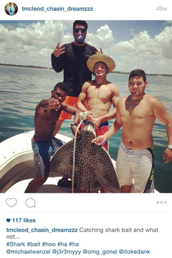 Instagram photo of Michael and friends with a spotted eagle ray they caught which is a protected species that is illegal to harvest