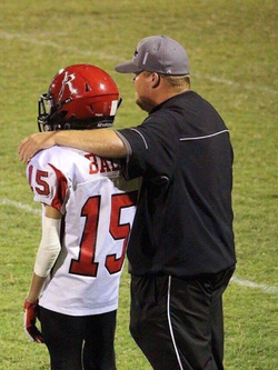 Thomas on the sidelines with his coach