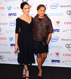 Photo of Doria Ragland and her daughter, Meghan Markle, at a red carpet event.