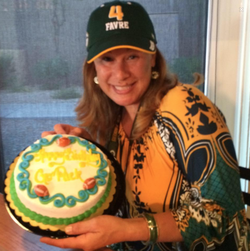 Photo of Cathryn Gorospe wearing Greenbay packers hat.