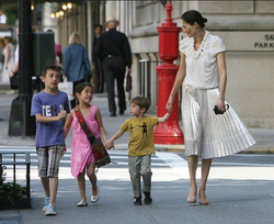 Photo of Annette Roque with her three children.