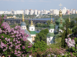 Lilacs in the National Botanical Garden, with the Vydubychi Monastery, Darnitskiy Rail Bridge and left-bank Kiev visible in the background.