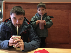 Photo of Matt Clemenso n with his son.