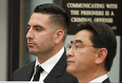 Richard Fischer with his defense attorney Richard Pinckard at his arraignment