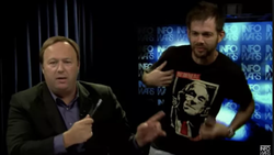 Image of Rob Jacobson with Alex Jones during the moments when he is told to leave the set of the shot InfoWars.