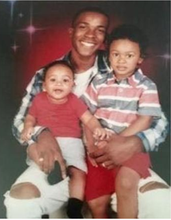 Photo of Stephon Clark with his children.