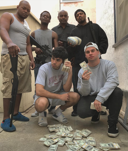 Image of some of the members of NELK with gangsters.