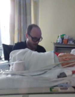 Photo of Christian Cuber t with the baby of his sister.