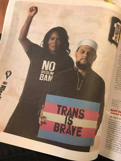 Ebony Ava Harper wearing a "No Muslim Ban" shirt
