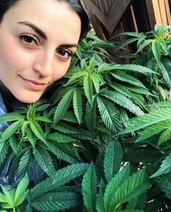 Charlotte Palermino photo with a indica cannabis plant.