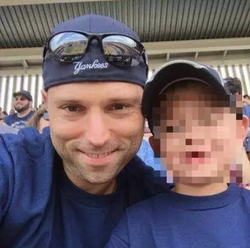 Thomas Tramaglini with his son.