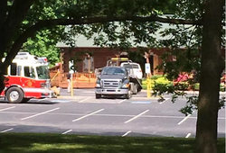 Photo of Self's SUV inside the Surf and Turf Lodge restaurant after the crash