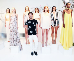 Andrew pictured with several models