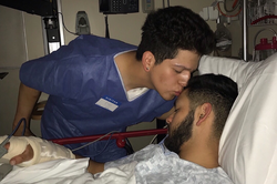 Photo of the victims Christopher Huizar and Gabriel Roman in hospital after the assault.