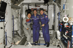 NASA astronaut Peggy Whitson, Expedition 16 commander; Russian Federal Space Agency cosmonaut Yuri Malenchenko, flight engineer; and South Korean spaceflight participant Soyeon Yi pose for a photo in the Harmony node of the International Space Station.