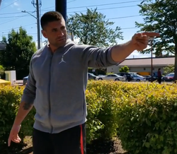 Steven Jay Watts pointing and threatening someone during the incident
