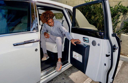 Photo of Tyreil Jones inside of a Rolls Royce that is posted on Facebook with the following message: "Money may not buy happiness, But it’s better to cry in a Rolls Royce."