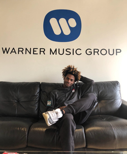 Tyreil Jones waiting for a scheduled meeting inside of Warner Brothers headquarters.