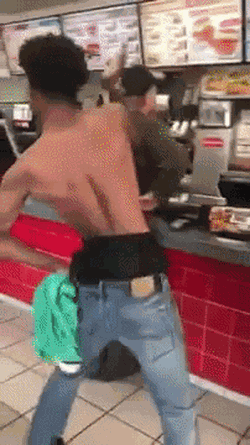 Tyreil Jones dancing inside of a fast-food restaurant.