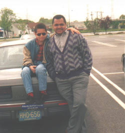 Tavarish at age 6 with his father in front of their 1992 Pontiac Sunbird