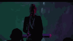 GIF of Lingua Ignota performing live in June 2018.