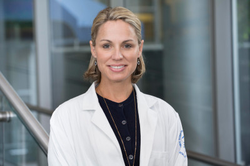 Dr. Nicole Saphier in her medical uniform