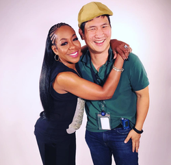 Photo of Rodney Ho with actress, Tichina Arnold.