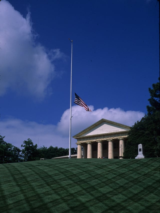 The flag at Arlington House is lowered to half-staff during interments