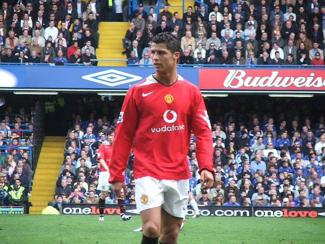 Ronaldo playing against Chelsea in the Premier League during his third season in England