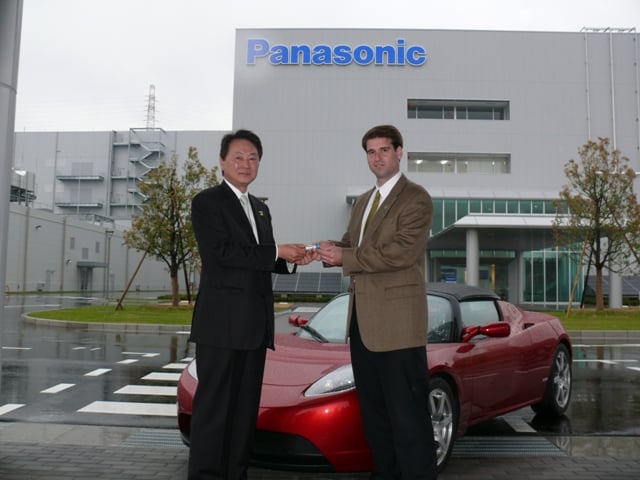 Panasonic Energy Company President Naoto Noguchi presented Tesla CTO JB Straubel with the first production run of lithium-ion cells from Panasonic's facility in Suminoe-ku, Osaka, Japan