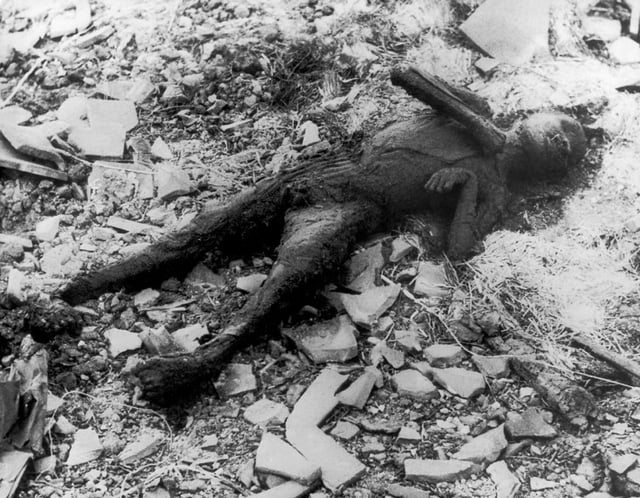 Partially incinerated child in Nagasaki. Photo from Japanese photographer Yōsuke Yamahata, one day after the blast and building fires had subsided. Once the American forces had Japan under their military control, they imposed censorship on all such images including those from the conventional bombing of Tokyo, this prevented the distribution of Yamahata's photographs. These restrictions were lifted in 1952.