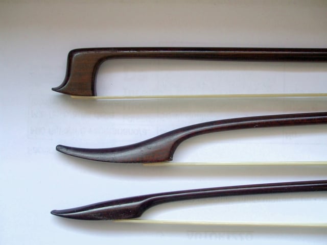 Heads of three violin bows: (upper) transitional (F.