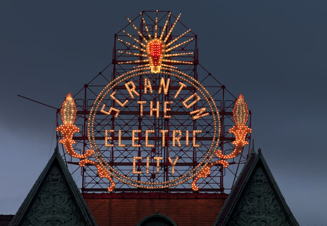 The Historic Electric City sign, restored in 2008, shines again